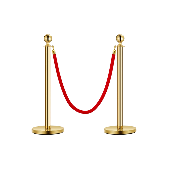 Two polished gold rope stanchions joined by a red velvet rope, shown against a plain background